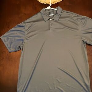 Nike golf dry-fit size men’s L shirt. Hardly ever worn, not sure it has been.
